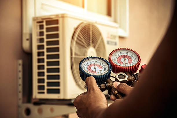 Professional Heat Pump Repair technician working in Whaleyville, MD